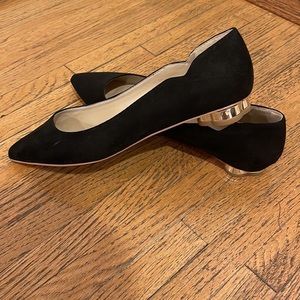 White House Black Market black suede shoes. Size 10m. Gold flower shaped heel.